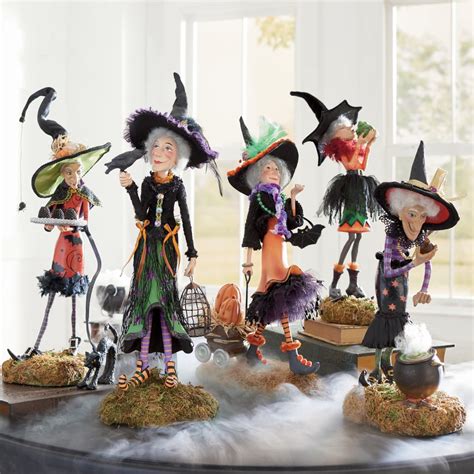 Create a hauntingly beautiful display with Halloween witch stakes figurines